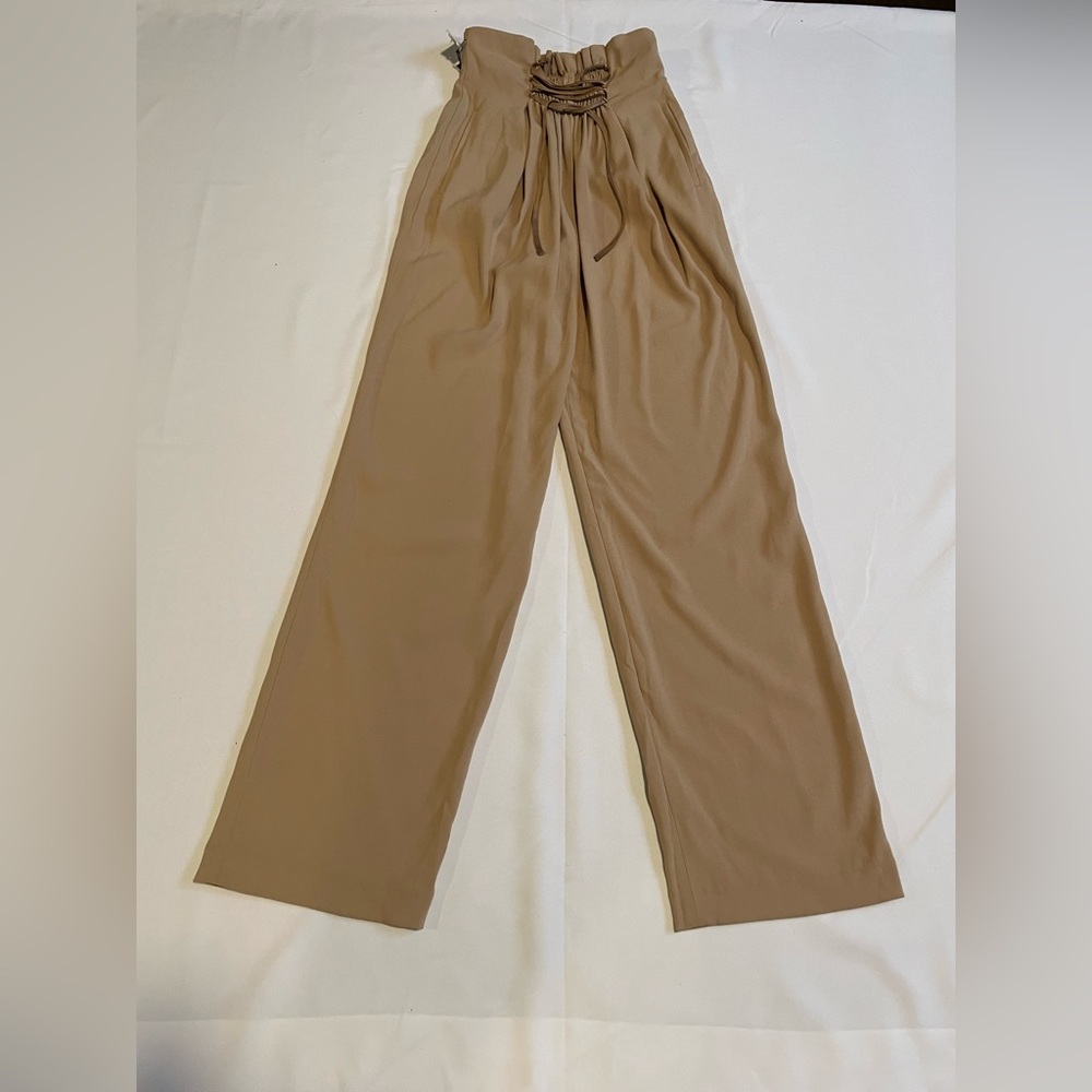 Babaton , small , tan